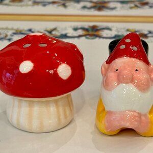 set of Cracker Barrel mini reclining gnome and mushroom salt and pepper shakers